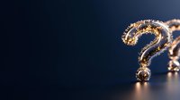 Golden question mark on dark background with reflective surface and dramatic lighting, symbolizing mystery, uncertainty, and problem-solving in business concepts.