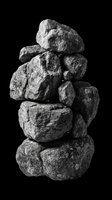 Stacked gray rocks balanced in tower formation, isolated on transparent background, ready for clipart, t-shirt design, stickers, print-on-demand products, and sublimation projects.