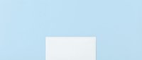 Blank white rectangular card or paper mockup on soft blue background, ready for design, branding, and marketing presentations.
