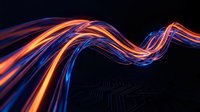 Abstract flowing light trails in vibrant orange and blue neon colors swirling across dark background, representing motion, energy, and digital technology concepts for modern design projects.