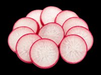 Sliced radish rounds isolated on transparent background, ready for culinary designs, food packaging, recipe graphics, cooking blogs, restaurant menus, and print-on-demand products.