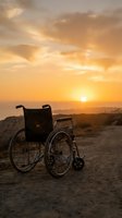 Empty wheelchair on rural road at golden sunset, symbolizing hope, recovery, rehabilitation, and overcoming physical challenges in healthcare and wellness contexts.