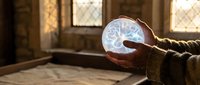 Hands holding glowing brain model in medieval stone room with diamond-paned windows, representing knowledge, learning, education and mental health concepts.