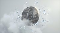 Silver bitcoin cryptocurrency coin exploding with glass fragments on white background for financial technology and digital currency concepts.
