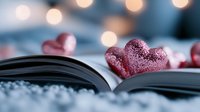 Open book with sparkling pink hearts and warm bokeh lights creating romantic atmosphere for Valentine's Day reading and love stories.