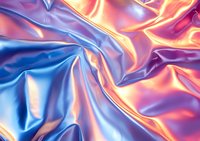 Luxurious silk fabric with vibrant blue and orange gradient colors creating elegant folds and reflective surface texture. Smooth satin material with glossy sheen.