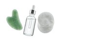 Natural skincare essentials with cucumber, serum bottle and cotton pads on white background for beauty and wellness routines.