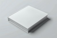 Stack of blank white square books or magazines on gray surface for mockup and branding design projects.