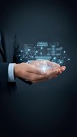Businessman hands presenting holographic network diagram with strategic alignment and organizational connectivity concepts for corporate planning.