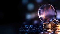 Magnifying glass on stack of golden coins with stock market graph reflection, dark background with bokeh lights. Financial analysis concept.