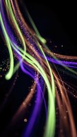 Vibrant neon light trails with glowing particles create dynamic energy flow on black background for digital art and modern design projects.