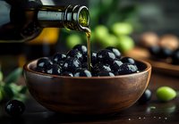 Fresh black olives in rustic wooden bowl with pouring extra virgin olive oil, moody dark food photography with natural lighting and bokeh effect.