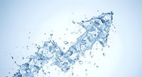 Dynamic water splash with droplets and bubbles creating fluid motion against clean white background for refreshing beverage and hydration concepts.