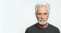 Senior man with white hair and beard wearing black t-shirt, isolated on white background for portrait and headshot use.