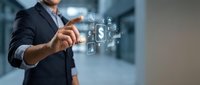 Businessman touching digital financial icons with dollar symbols and banking elements in modern office environment for fintech applications.