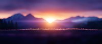Dramatic purple mountain landscape at sunset with glowing horizon and silhouetted forest treeline creating mystical atmospheric scene in nature.