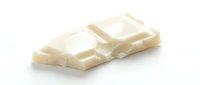White chocolate squares isolated on white background, ready for food packaging, confectionery design, and culinary applications.