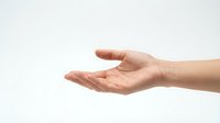Open palm hand gesture showing receiving or giving motion isolated on white background for presentation and design projects.