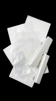 Clear plastic bags and rolls isolated on transparent background, ready for packaging design, product mockups, sublimation printing, and print-on-demand applications.