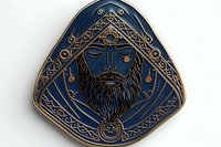 Mystical bearded man face with ornate Celtic knot patterns and geometric designs in deep blue and gold tones on isolated background, suitable for fantasy art and jewelry design.