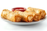 Crispy golden egg rolls served on white ceramic plate with bright red dipping sauce, showcasing flaky pastry texture and appetizing presentation for food service.