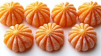 Fresh peeled mandarin oranges arranged in neat rows showing natural segments and bright orange color on white background, isolated citrus fruit composition.