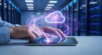 Business professional using tablet with holographic cloud computing interface in modern data center server room for digital transformation solutions.