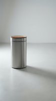 Stainless steel storage container with wooden lid on white background, isolated for product design and kitchen organization use.