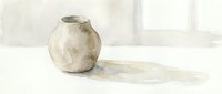 Minimalist watercolor ceramic vase with soft beige tones casting gentle shadow on white surface for home decor and interior design projects.