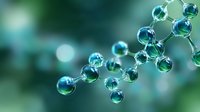 Molecular structure with connected glass spheres in turquoise and blue tones on blurred background illustrates scientific concept of chemistry and biology research.