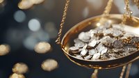 Silver coins on golden balance scale against dark background with bokeh lights, symbolizing financial balance, wealth management and investment decisions.