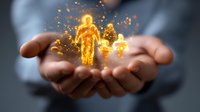Glowing golden human silhouette floating above open palms with magical sparkles and light particles, representing spiritual energy, soul, and divine transformation.