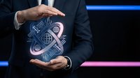 Professional businessman in dark suit protecting digital technology symbols with hands showing cybersecurity and data protection concept for business presentations.