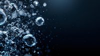 Underwater air bubbles rising in dark blue water with sunlight creating magical bokeh effect and natural lens flare, macro photography for aquatic backgrounds.