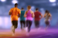 Motion blurred group of diverse runners training on athletic track at dusk, creating dynamic streaks of color against dramatic evening sky.