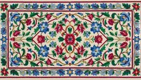 Traditional floral carpet with ornate Persian-style motifs and colorful botanical border design on cream background for home decor and textile applications.