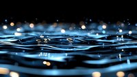 Mesmerizing water surface with ripples and bokeh light effects creating magical atmosphere at night, macro photography showing liquid texture and reflections.
