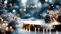 Winter holiday background with snow-covered pine branches, pinecones and warm golden lights creating festive atmosphere for seasonal celebrations.