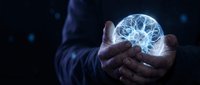 Hands holding glowing brain neural network on dark background, representing artificial intelligence, innovation, technology, and digital transformation in business and science.