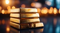 Stacked gold bars with warm bokeh lights in background reflecting on glossy surface. Wealth and financial investment concept for banking and trading.