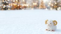 Cute white elephant figurine with golden horns sitting on snow with blurred festive lights and winter trees in background, suitable for holiday greeting cards and seasonal designs.