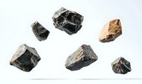 Floating raw coal and mineral chunks on white background, arranged in minimalist composition for mining and energy industry concepts.