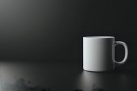 White ceramic coffee mug on dark background with dramatic lighting and copy space for text or logo placement, minimalist composition for advertising and branding.
