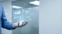 Businessman displaying holographic data analytics dashboard with charts and graphs in modern office environment for business intelligence presentations.