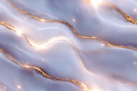Luxurious abstract waves in soft lavender and gray with shimmering gold veins create elegant marble effect pattern for luxury design and home decor backgrounds.