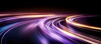 Glowing curved light trails in motion against dark background create dynamic speed effect with purple, orange and white streaks for technology concepts.