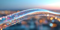 Glowing light waves with sparkles flow across blurred bokeh background in soft blue and orange tones, creating magical abstract composition for design projects.