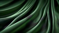 Luxurious dark green satin fabric with elegant folds and waves creates dramatic lighting effects and smooth texture for fashion and luxury backgrounds.