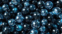Glowing blue spheres with reflective surfaces create abstract pattern background. Metallic orbs with light effects form futuristic technological composition.