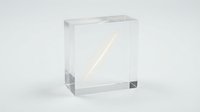 Clear acrylic cube block with diagonal light beam passing through transparent material creating modern minimalist display piece for presentations.